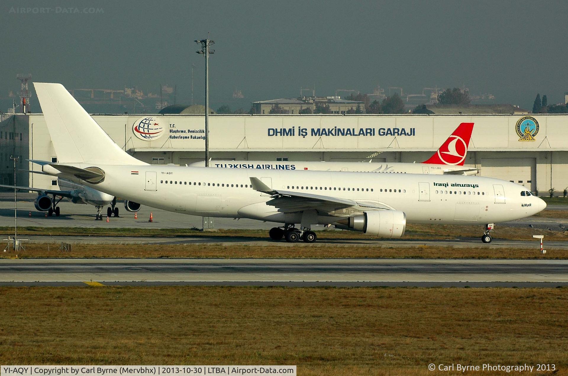 YI-AQY, 2012 Airbus A330-202 C/N 1339, Taken from the Fly Inn Shopping Mall.