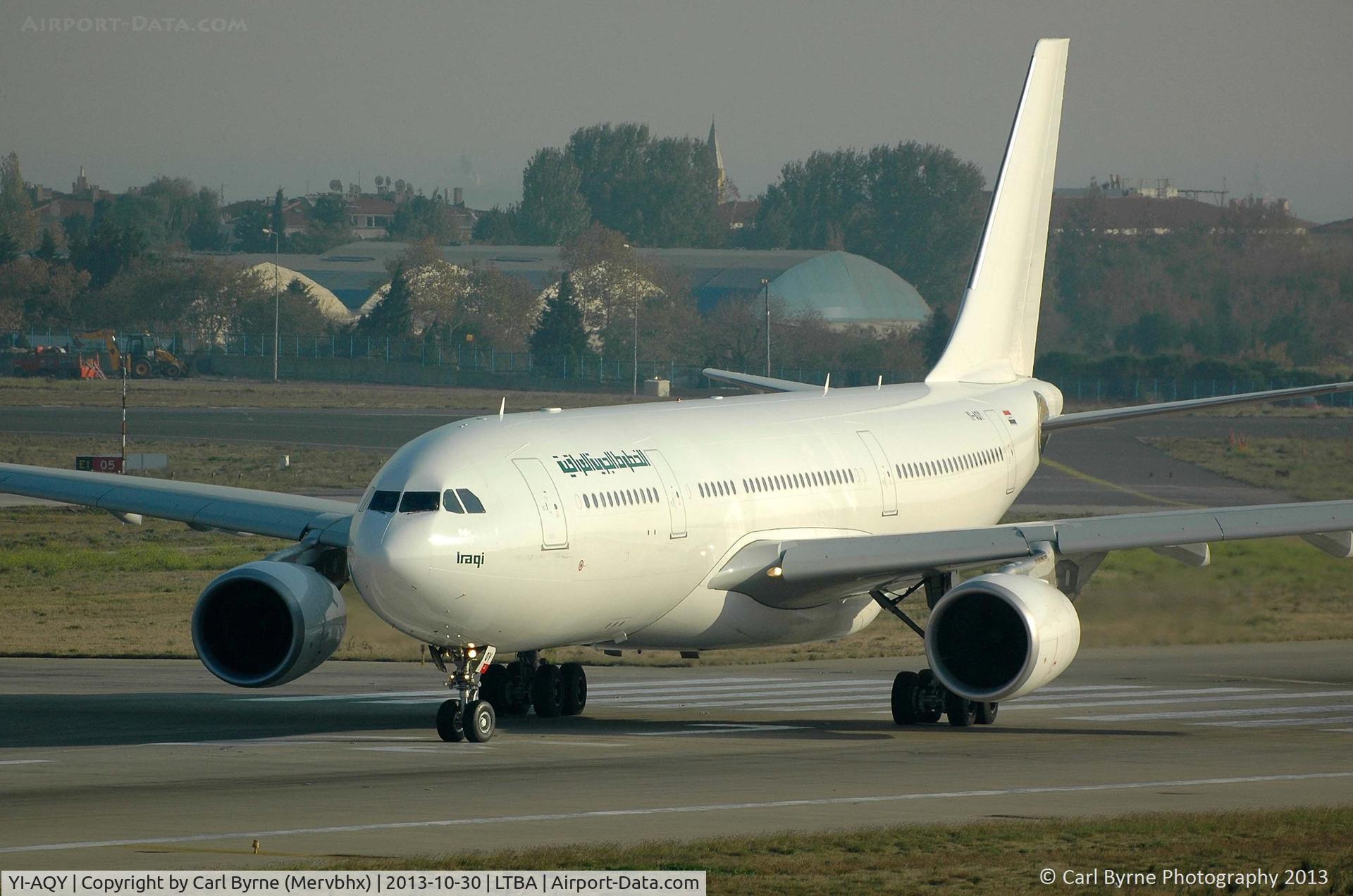 YI-AQY, 2012 Airbus A330-202 C/N 1339, Taken from the Fly Inn Shopping Mall.