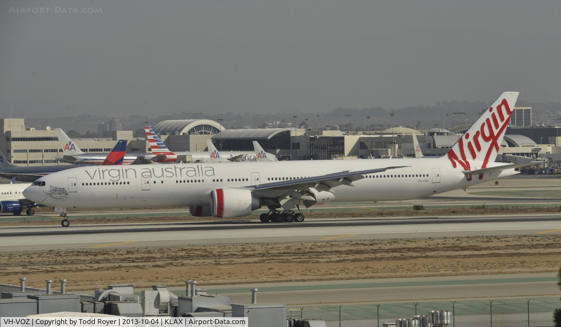 VH-VOZ, 2008 Boeing 777-3ZG/ER C/N 35302, Taxiing to gate at LAX