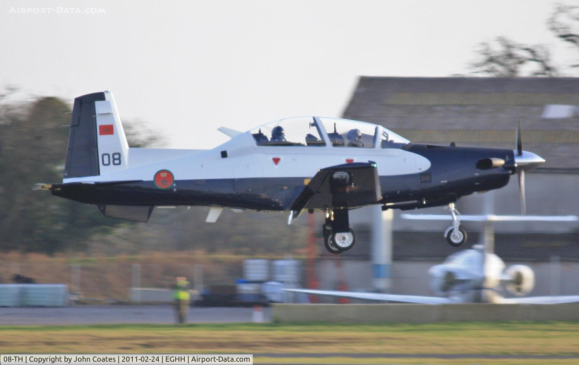 08-TH, 2011 Raytheon T-6C Texan II C/N PM-8, About to touchdown on delivery flight