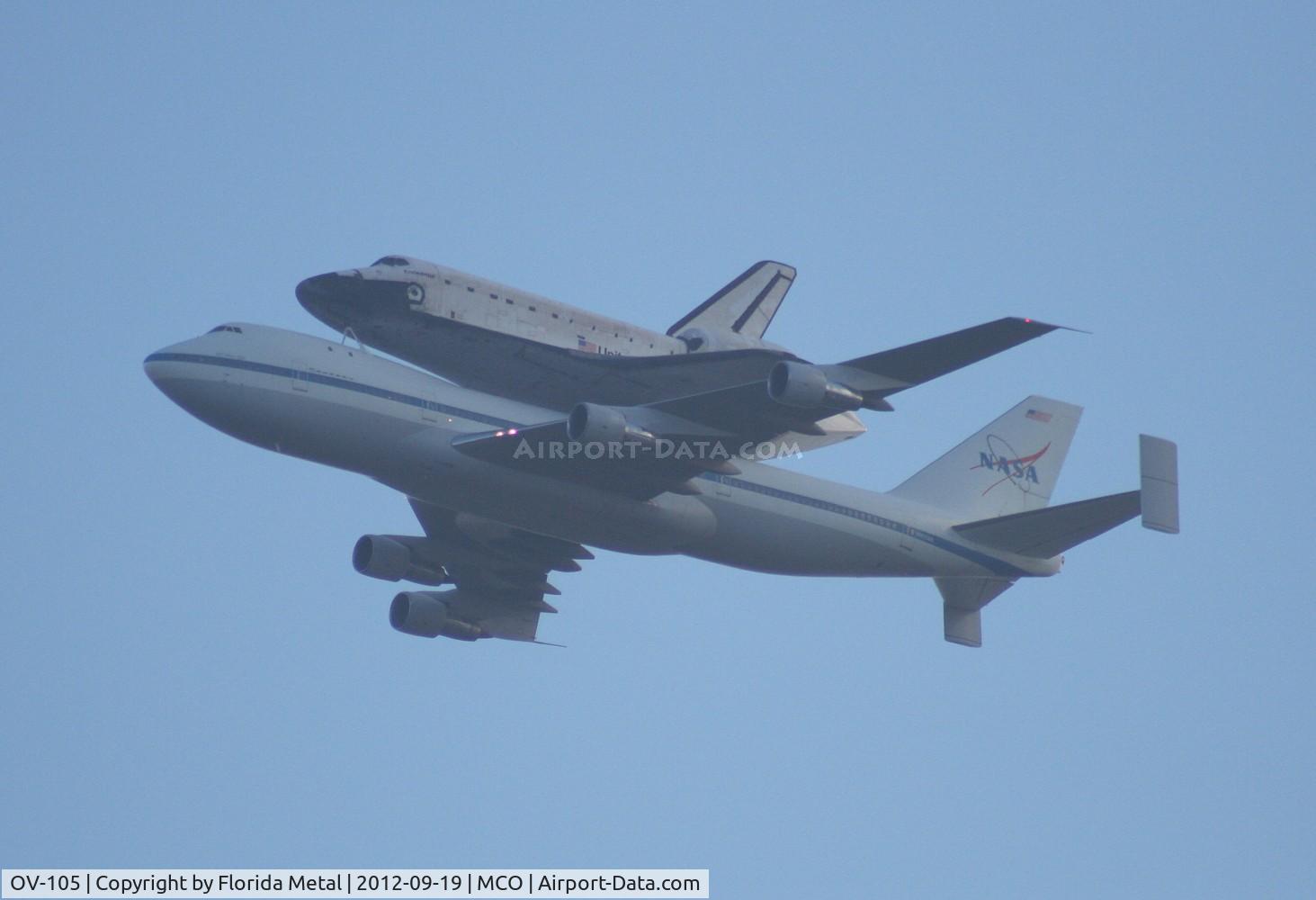 OV-105, 1991 Rockwell International Shuttle C/N 105, Space Shuttle Endeavor riding on the back of the 747 over Orlando International Airport