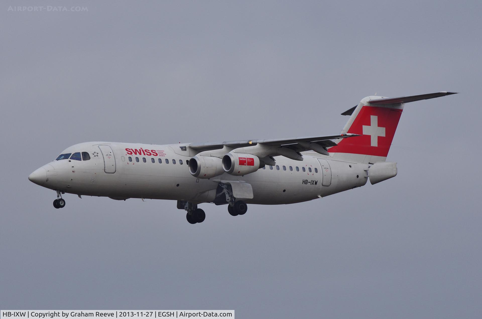 HB-IXW, 1995 British Aerospace Avro 146-RJ100 C/N E3272, About to land on runway 27.