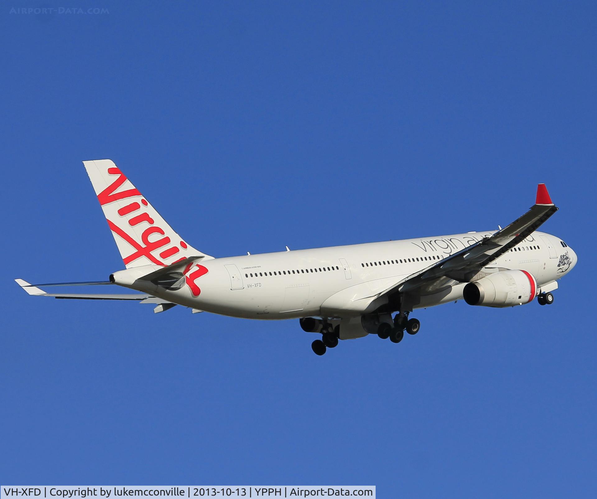 VH-XFD, 2012 Airbus A330-243 C/N 1306, On takeoff roll to Melbourne.
