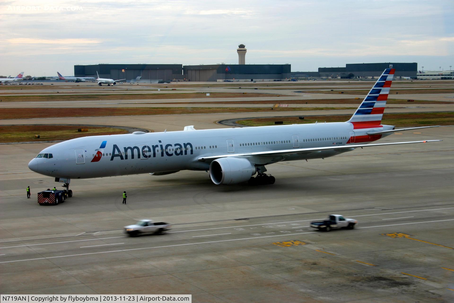 N719AN, 2013 Boeing 777-323/ER C/N 41668, Pushing back from Terminal D.