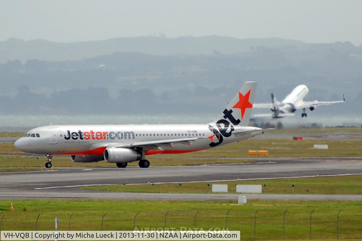 VH-VQB, 2009 Airbus A320-232 C/N 3743, Brand new ZK-OXB (with sharklets) taking off in the background