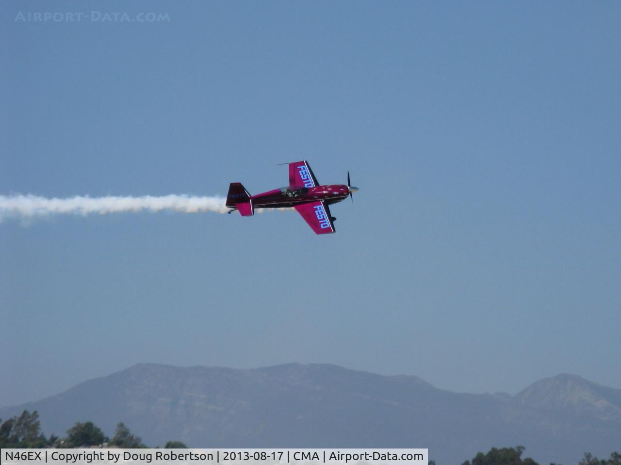 N46EX, 1993 Extra EA-300S C/N 014, 1993 Extra Flugzeugbau Gmbh EXTRA 300/S, extreme aerobatics with smoke-Vicki Benzing-pilot in low pass over Rwy 08