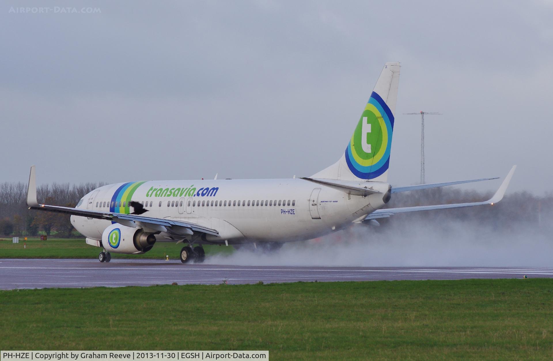 PH-HZE, 1999 Boeing 737-8K2 C/N 28377, Taking off from a wet runway 27.