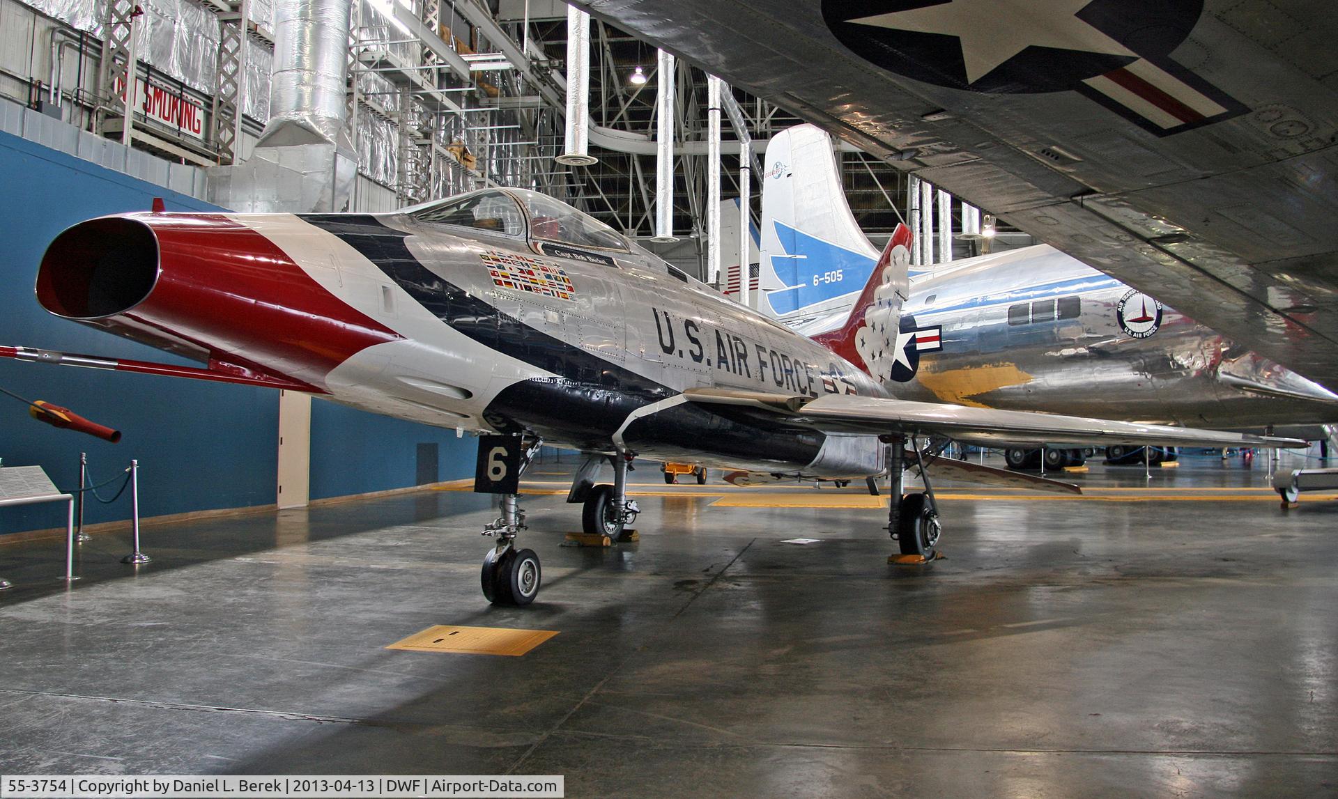 55-3754, 1956 North American F-100D Super Sabre C/N 223-436, One of the Thunderbirds ships shares hangar space with a gaggle of presidential aircraft.