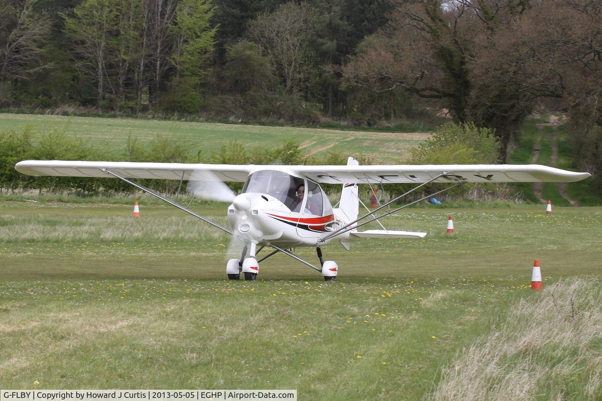 G-FLBY, 2013 Comco Ikarus C42 FB100 Bravo C/N 1302-7239, Privately owned. At the Microlight Trade Fair.