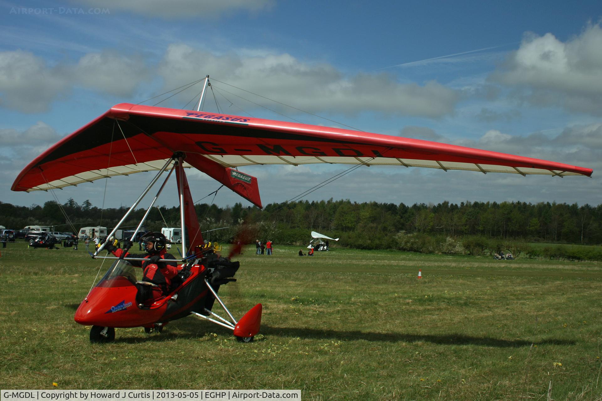 G-MGDL, 1998 Pegasus Quantum 15 C/N 7400, Privately owned. At the Microlight Trade Fair.