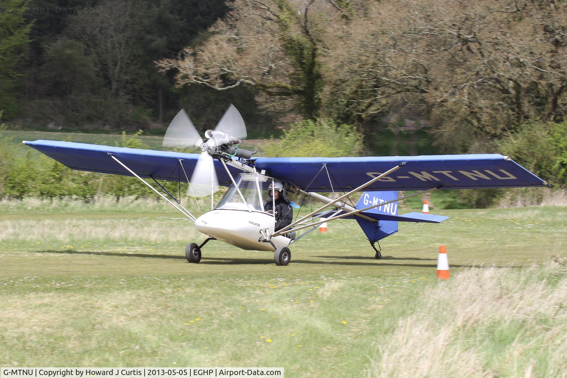 G-MTNU, 1987 Thruster TST MK1 C/N 897-TST-035, Privately owned. At the Microlight Trade Fair.