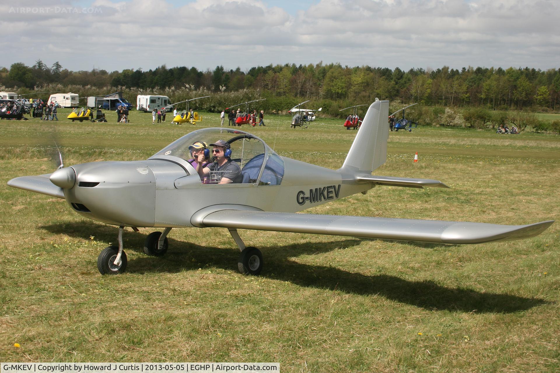 G-MKEV, 2009 Aerotechnik EV-97 Eurostar C/N LAA 315-14830, Privately owned. At the Microlight Trade Fair.