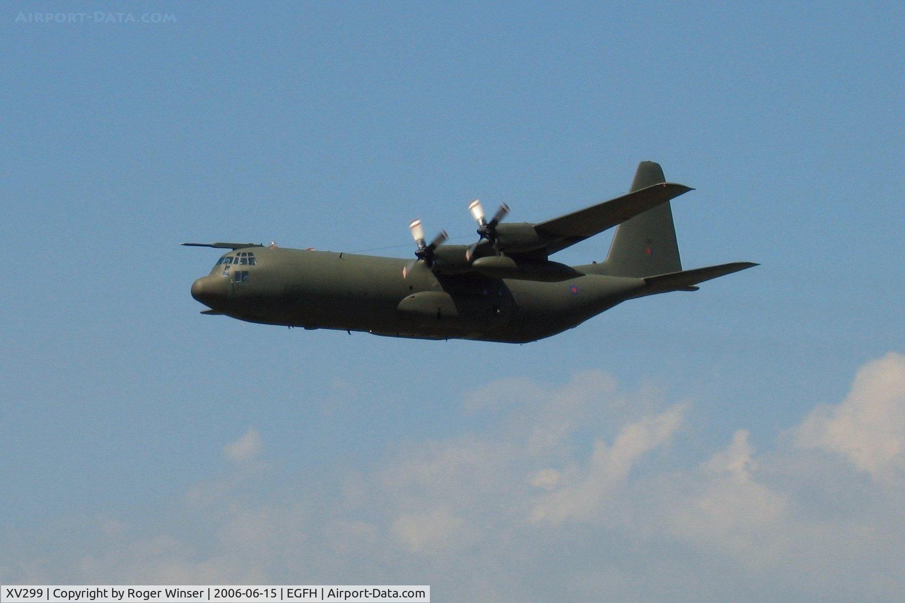XV299, Lockheed C-130K Hercules C.3 C/N 382-4266, RAF Hercules C.1 lengthend to C.3P standards from the Lyneham Transport Wing making a low pass over Runway 22. Exactly 65 years after the airfield was declared operational as RAF Station Fairwood Common.