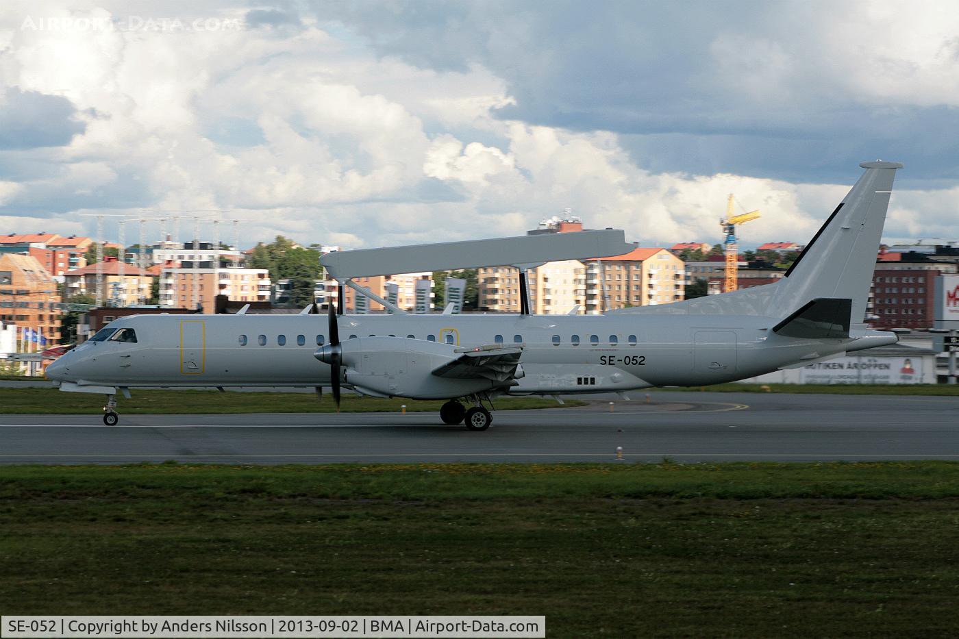 SE-052, 1997 Saab 2000 C/N 2000-052, Lining up runway 30.