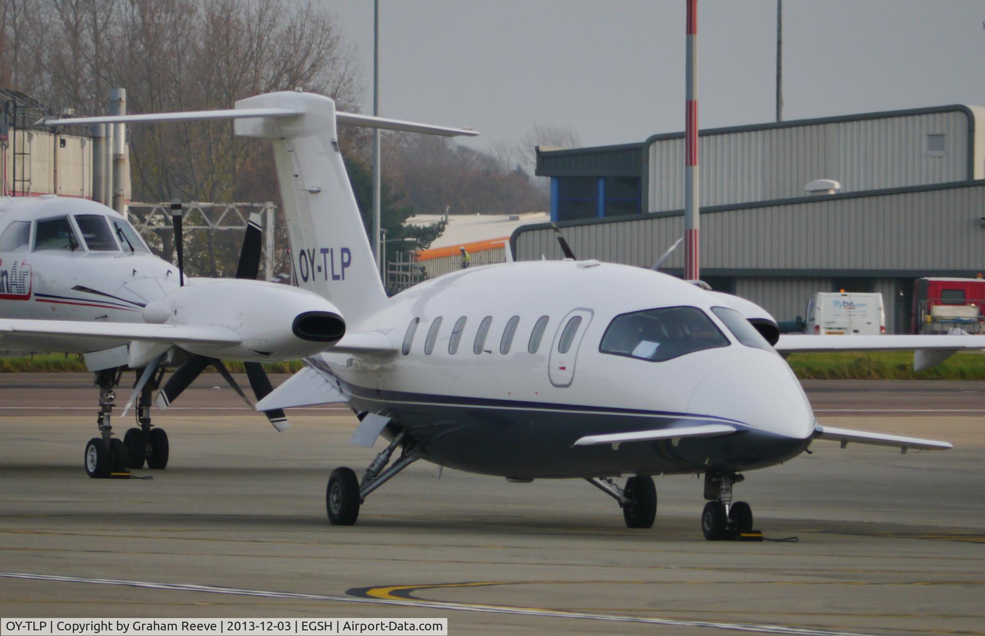 OY-TLP, 2003 Piaggio P-180 Avanti C/N 1060, Parked at Norwich.