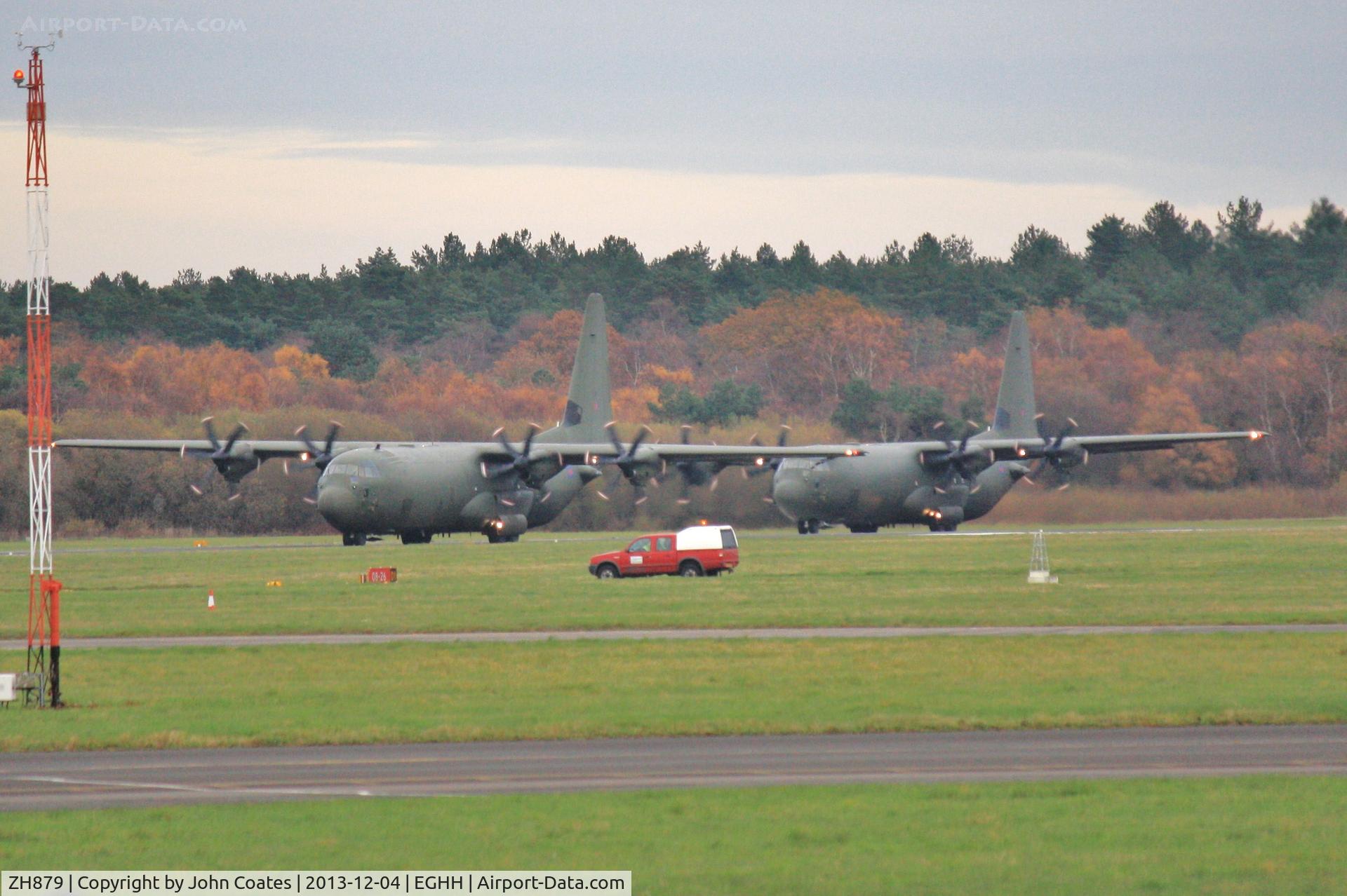 ZH879, 1998 Lockheed Martin C-130J-30 Hercules C.4 C/N 382-5463, Following ZH871 in formation departure for Para Drop