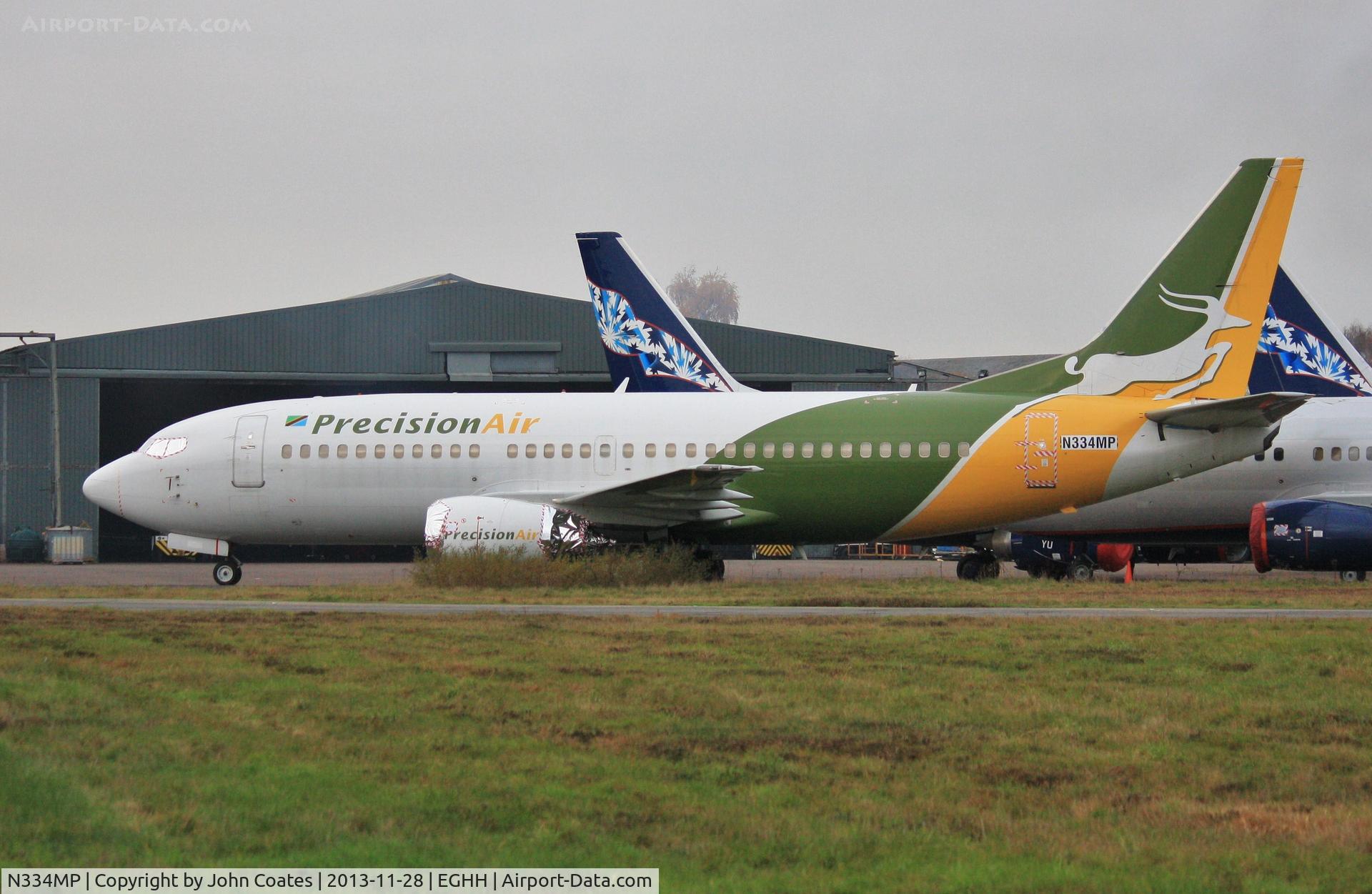 N334MP, 1999 Boeing 737-36N C/N 28596, Now alum. foiled - ready for Xmas?
