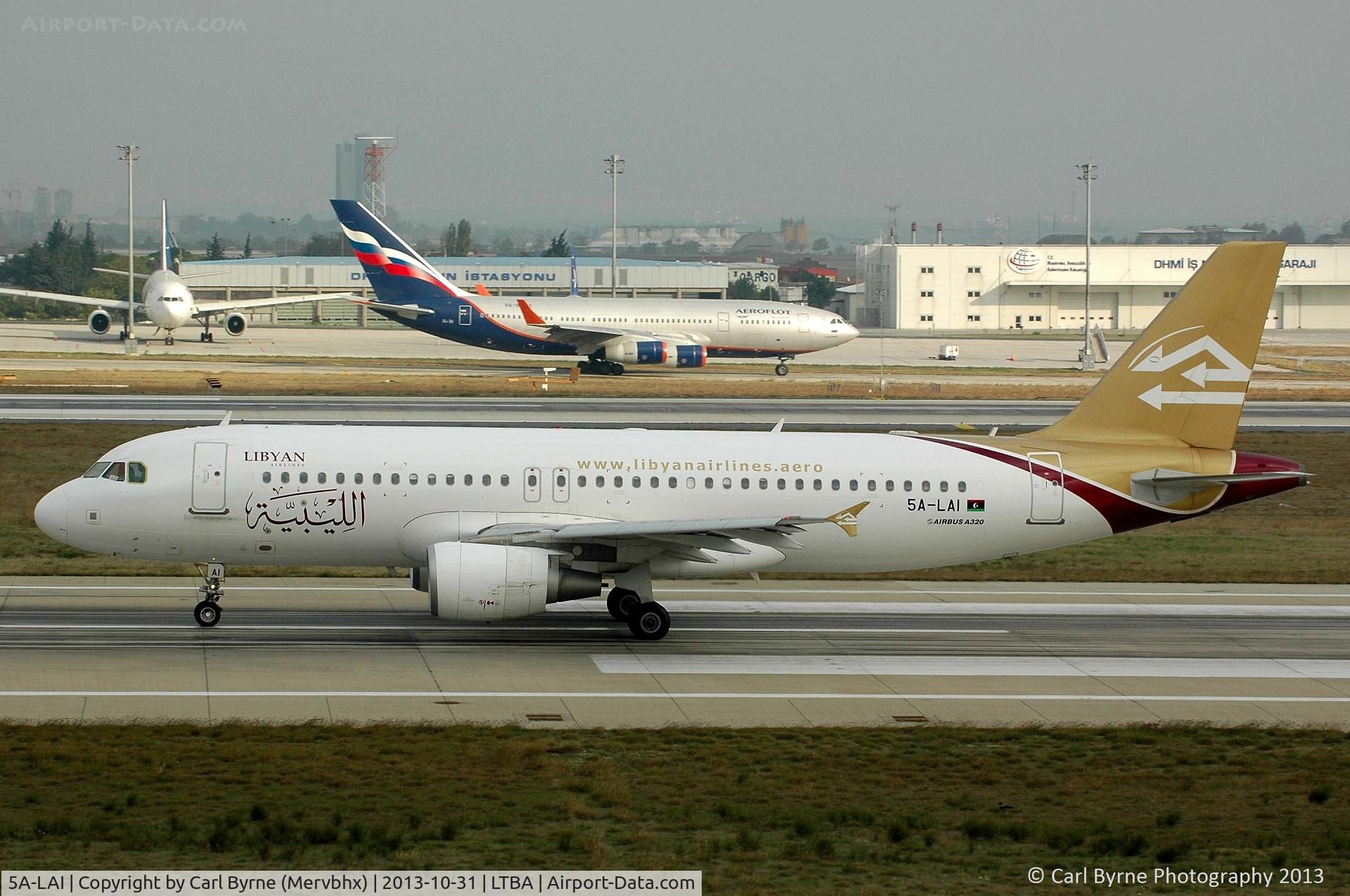 5A-LAI, 2010 Airbus A320-214 C/N 4450, Taken from the Fly Inn Shopping Mall.