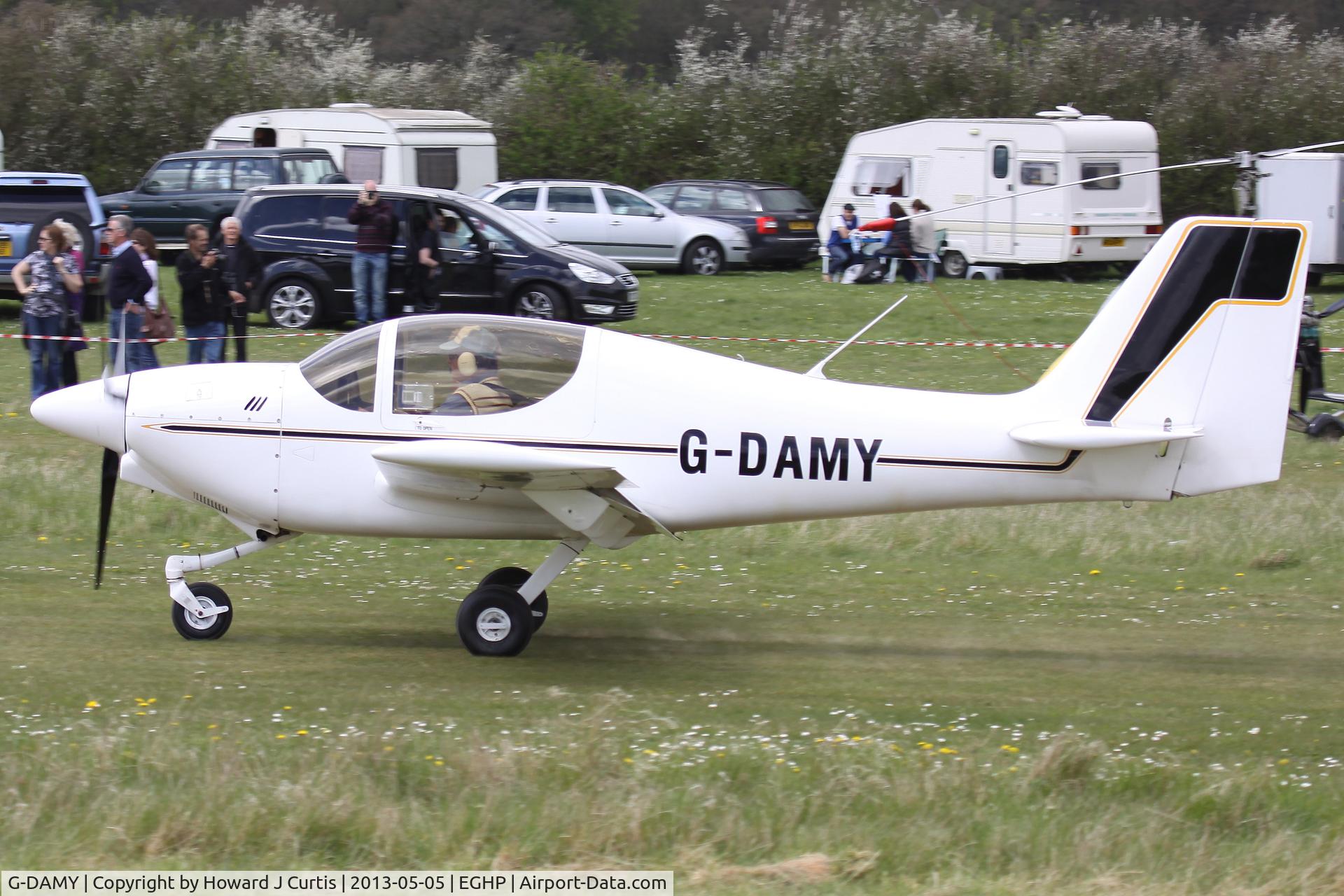 G-DAMY, 1996 Europa Tri Gear C/N PFA 247-12781, Privately owned, at the Microlight Trade Fair.