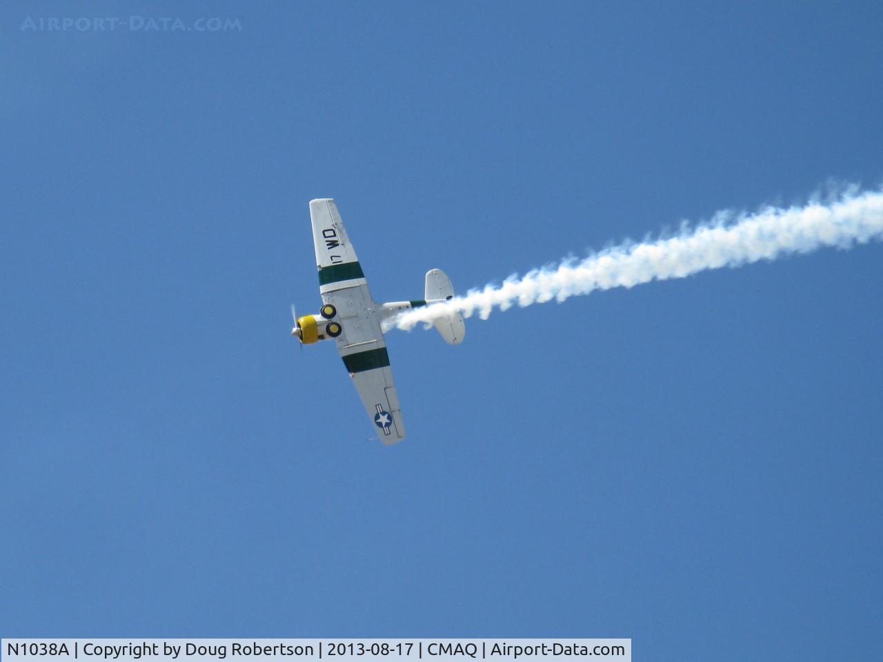 N1038A, 1944 North American SNJ-5 Texan C/N 90917 (121-41633), 1944 North American SNJ-5 'WAR DOG', P&W R-1340 Wasp 600 Hp, low level airshow with smoke
