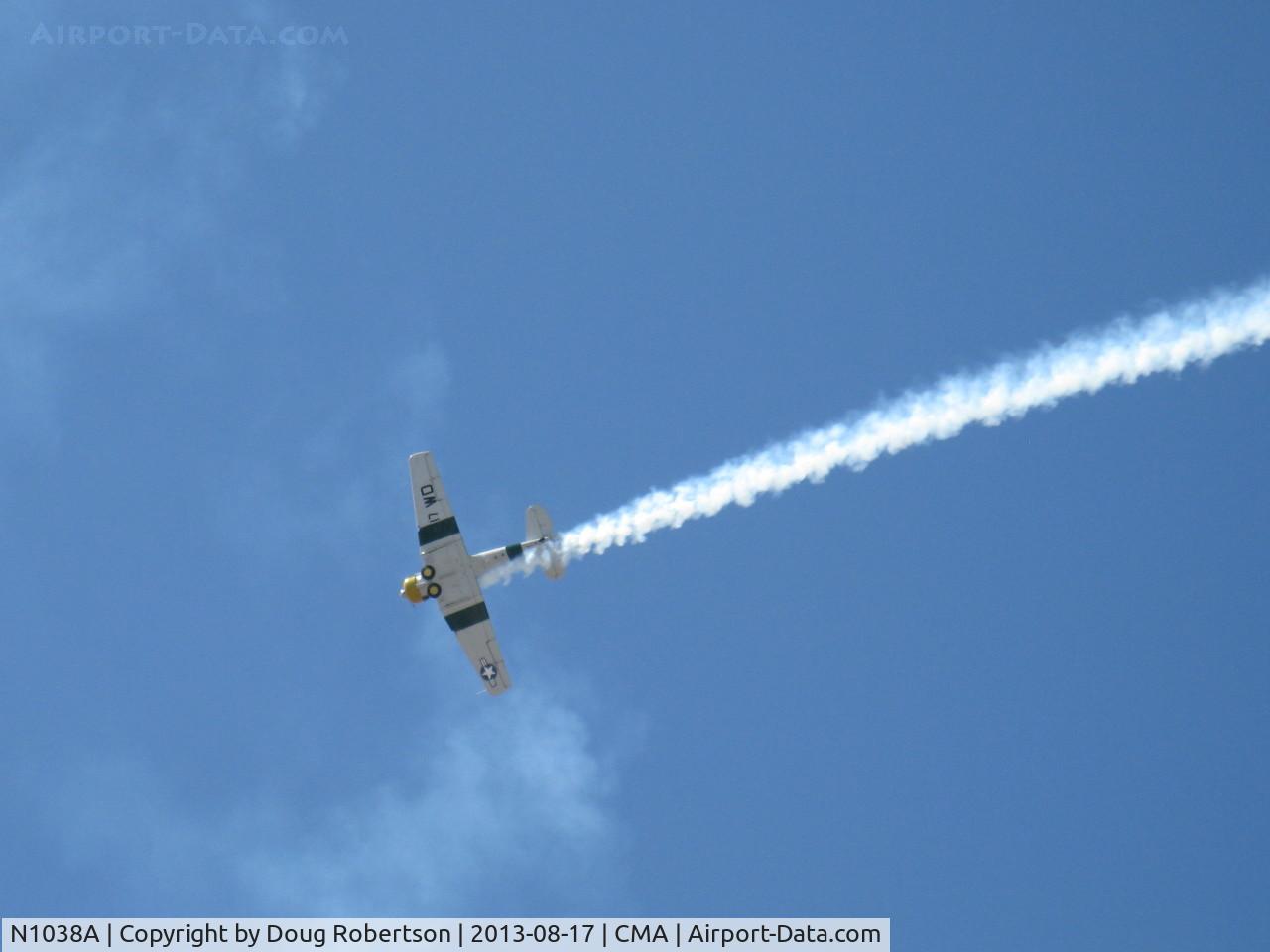N1038A, 1944 North American SNJ-5 Texan C/N 90917 (121-41633), 1944 North American SNJ-5 'WAR DOG', P&W R-1340 Wasp 600 Hp, low level airshow with smoke