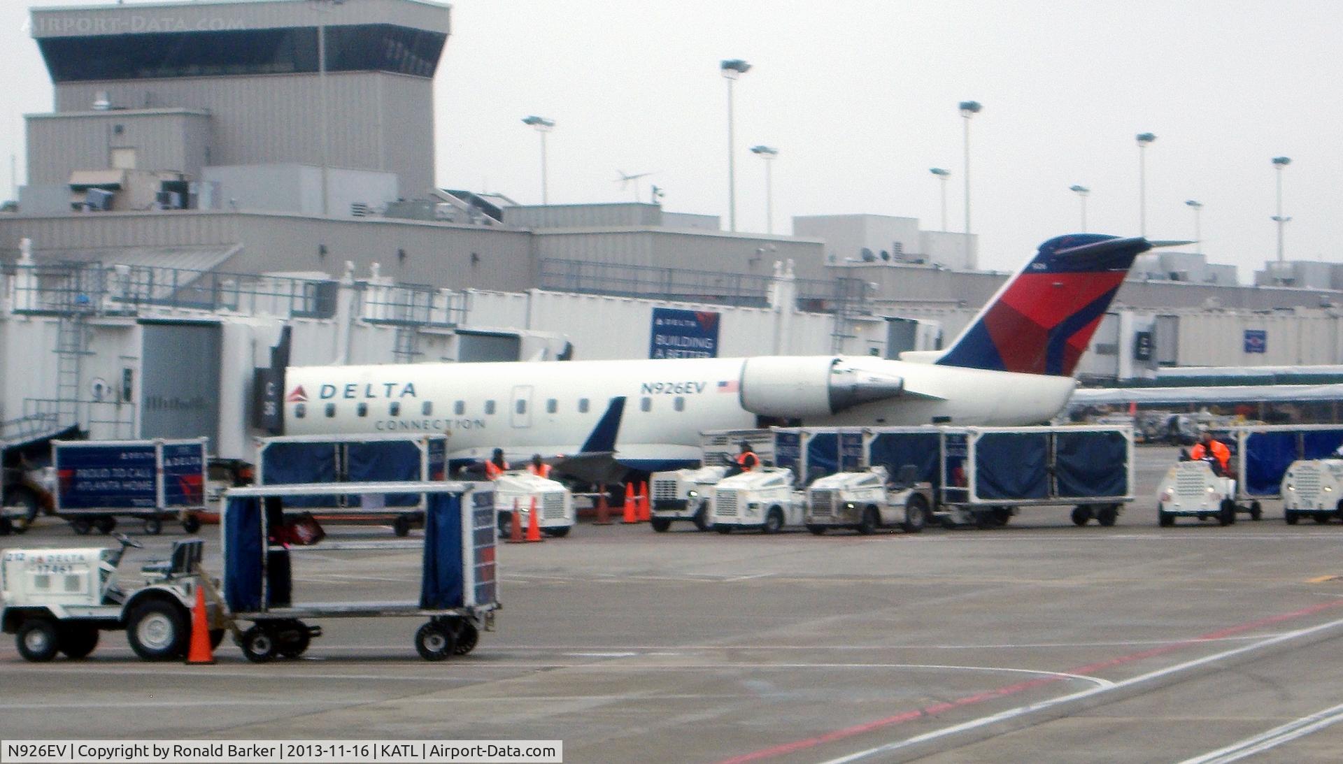 N926EV, 2003 Bombardier CRJ-200ER (CL-600-2B19) C/N 7843, Gate C-26, loading the aircraft.  Atlanta