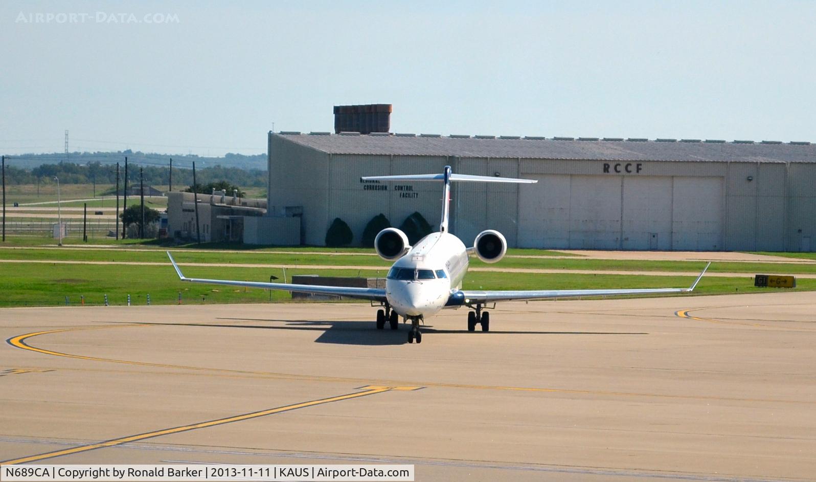 N689CA, 2007 Bombardier CRJ-900ER (CL-600-2D24) C/N 15133, Taxi to park Gate 5, Austin