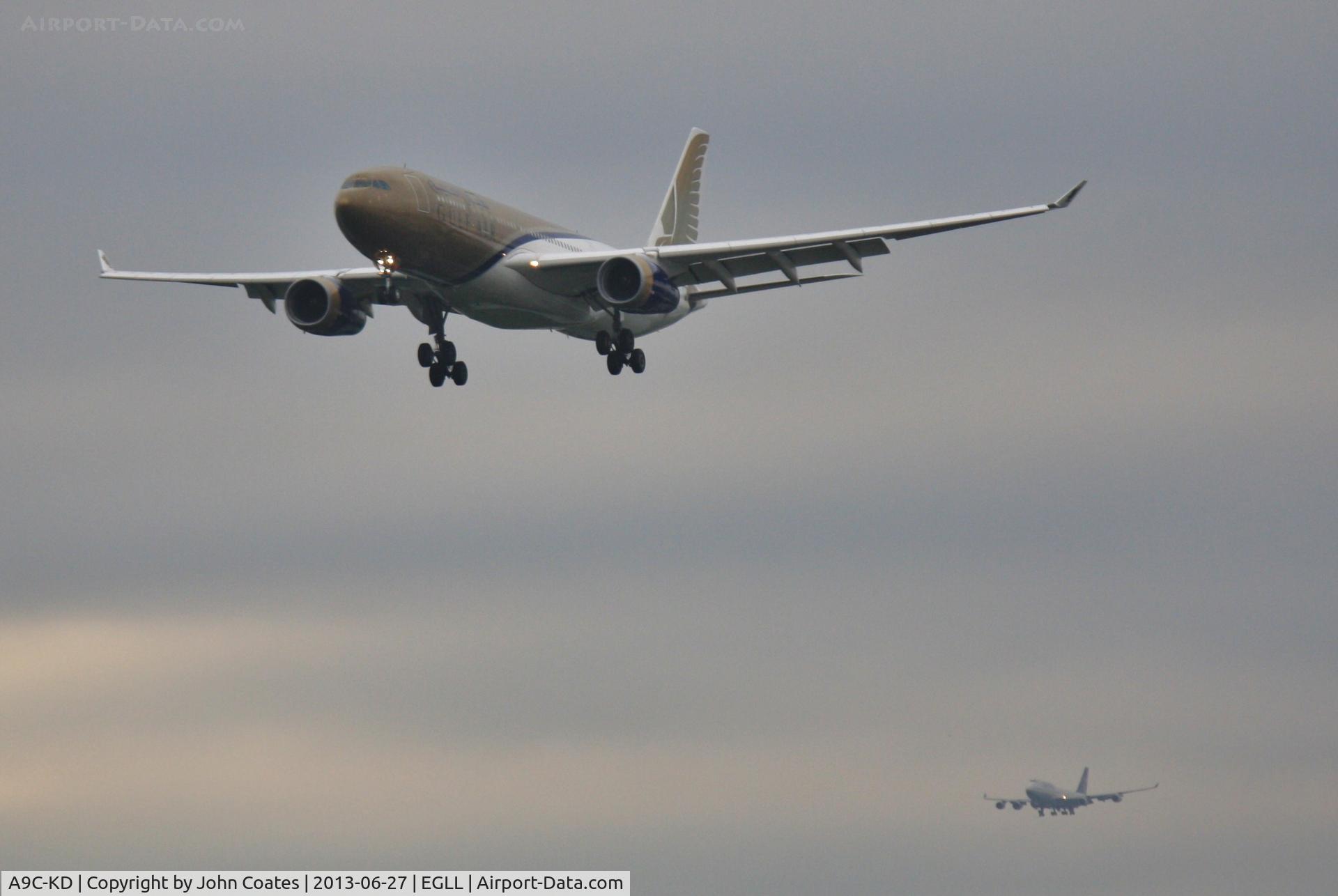 A9C-KD, 1999 Airbus A330-243 C/N 287, Not as close as it appears..United 74 is on 27R