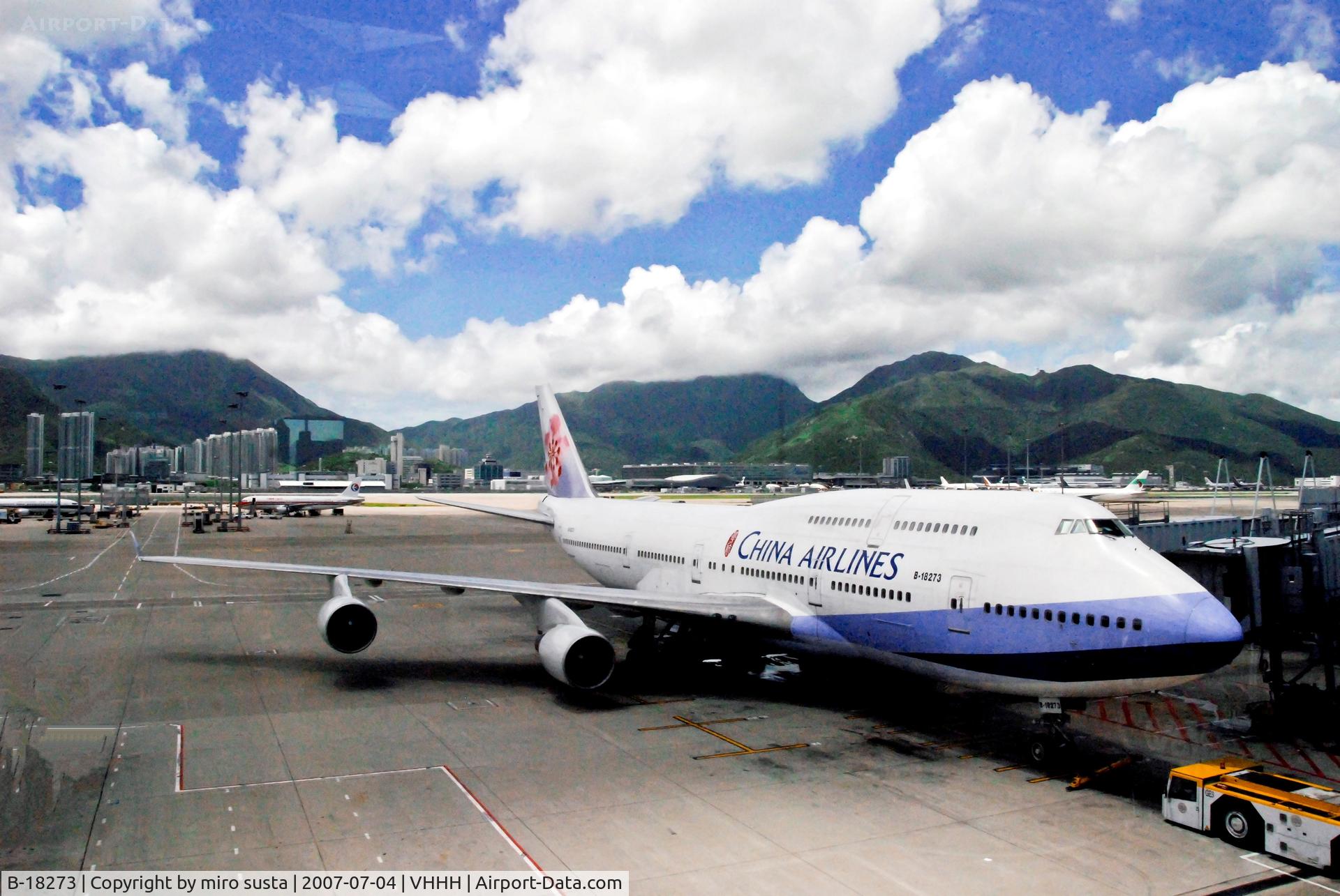 B-18273, 1991 Boeing 747-409SF C/N 24311, China Airlines Boeing B747-409 push back at Hong Kong International Airport.
