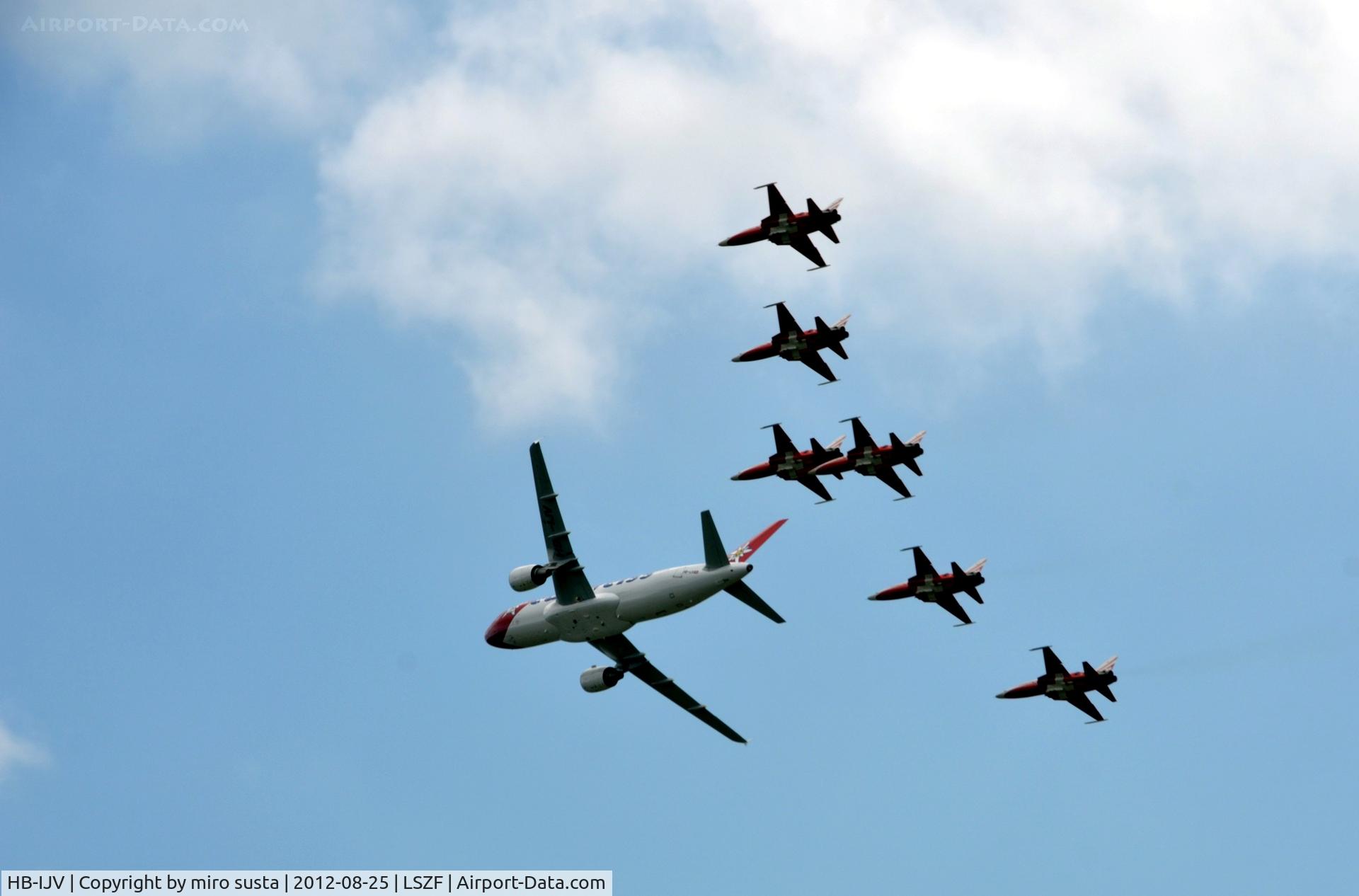 HB-IJV, 2003 Airbus A320-214 C/N 2024, Edelweiss Airlines Airbus A320 with company of Swiss Patrol airplanes during air-show at Birrfeld airfield in Switzerland.