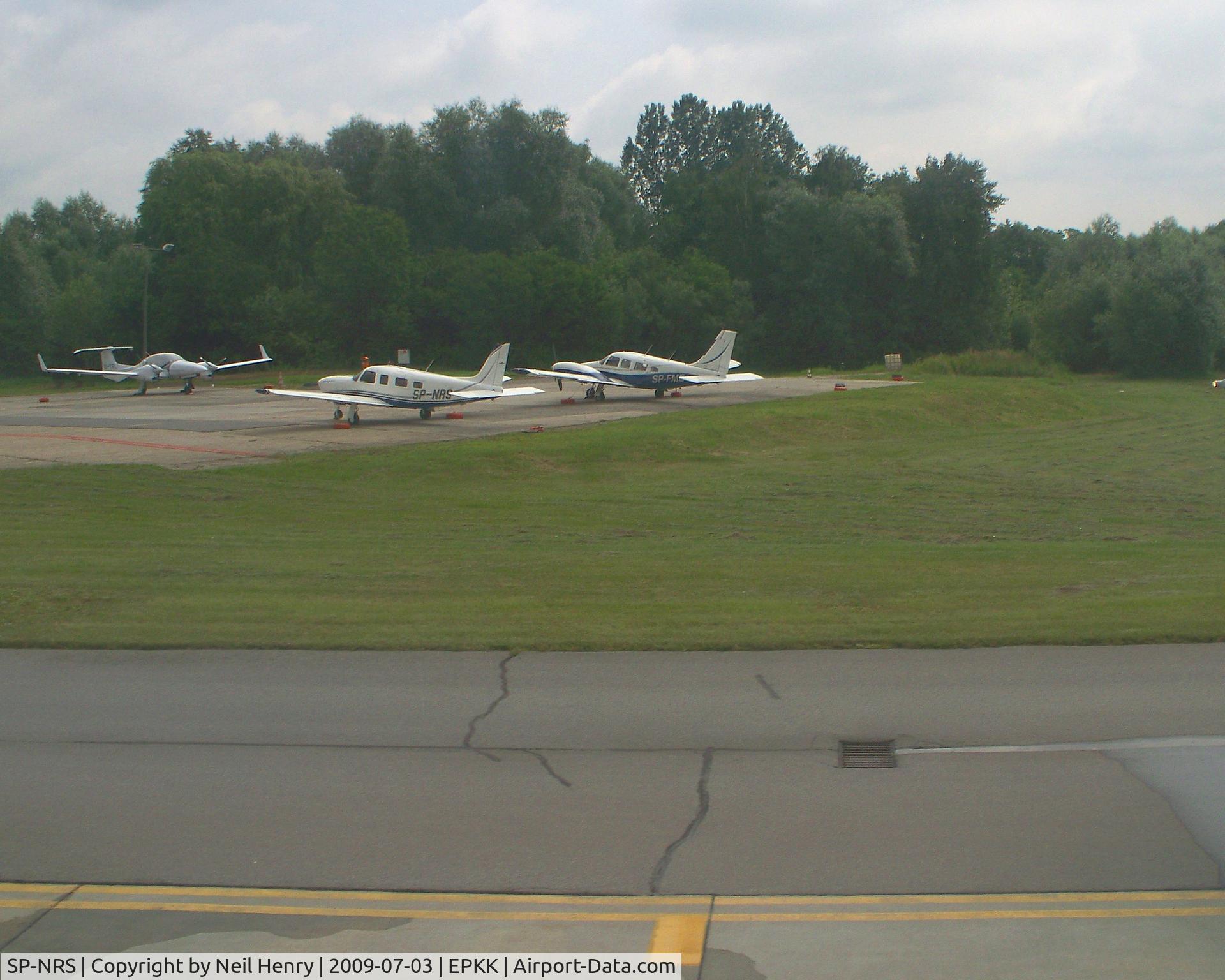 SP-NRS, 2007 Piper PA-32R-301T Turbo Saratoga C/N 3257471, taken from arriving British Airways flight