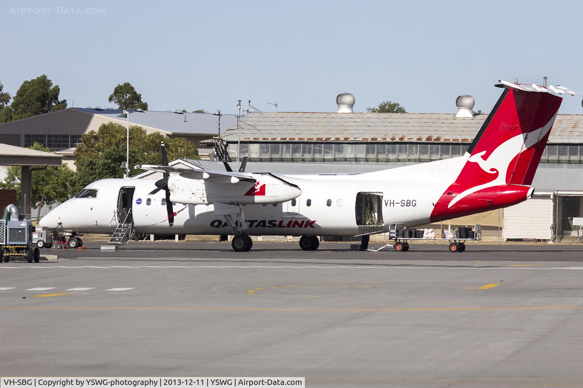 VH-SBG, 2001 De Havilland Canada DHC-8-315Q Dash 8 C/N 575, QantasLink (VH-SBG) Bombardier Dash 8 Q300 on the tarmac at Wagga Wagga Airport.