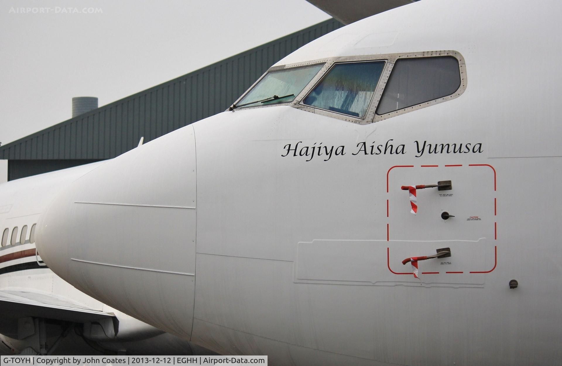G-TOYH, 1998 Boeing 737-36N C/N 28570, Now Azman Airlines and close up of new name.