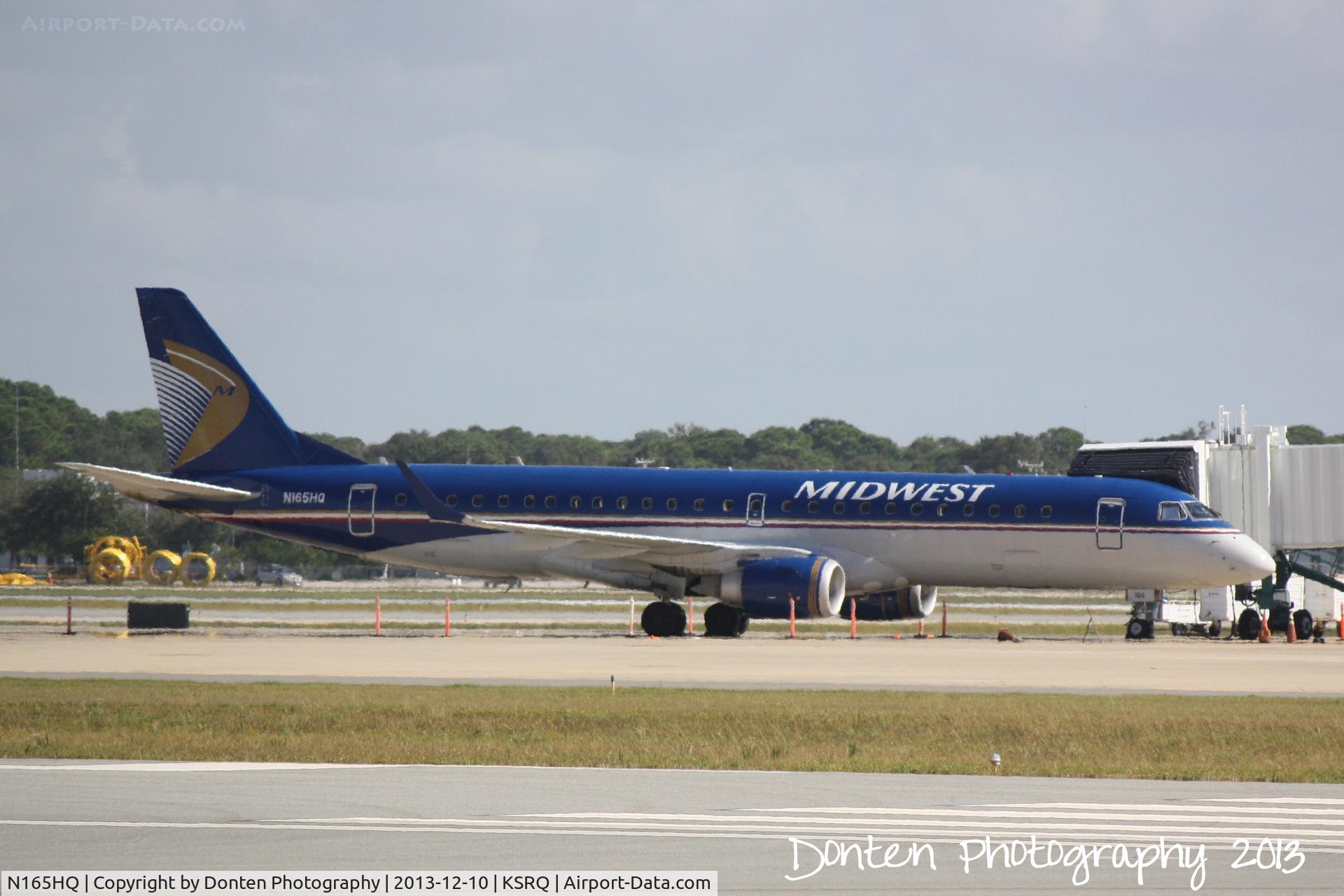 N165HQ, 2009 Embraer 190LR (ERJ-190-100LR) C/N 19000291, Republic Flight 5695 (N165HQ) sits at the terminal at Sarasota-Bradenton International Airport preparing for a flight to Tunica Municipal Airport