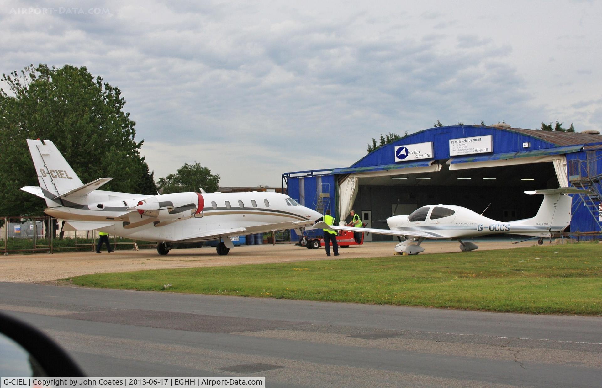 G-CIEL, 2002 Cessna 560XL Citation Excel C/N 560-5247, Outside paintshop with G-OCCS