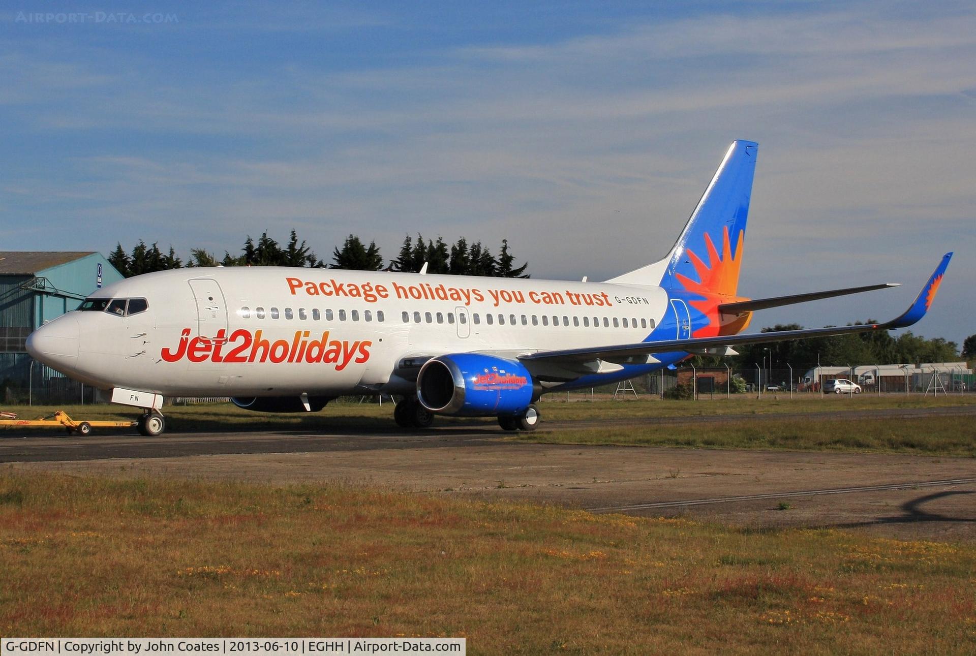 G-GDFN, 1998 Boeing 737-33V C/N 29332, Being towed from paintshop after repaint