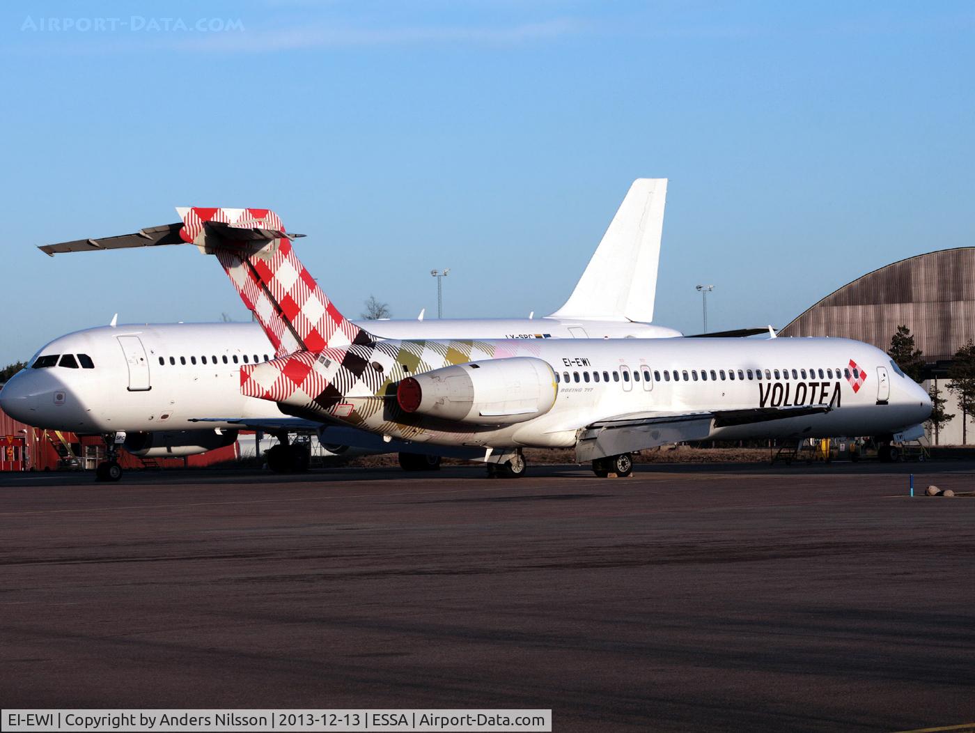 EI-EWI, 2003 Boeing 717-2BL C/N 55170, Parked at ramp J for maintenance.