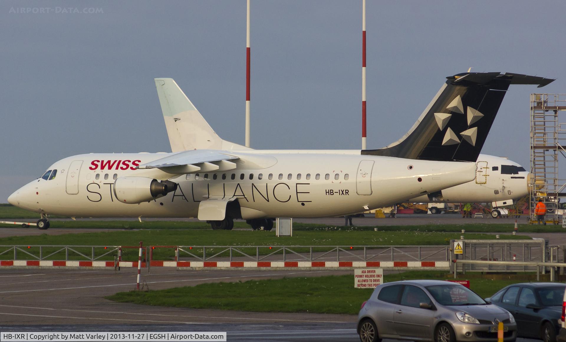 HB-IXR, 1996 British Aerospace Avro 146-RJ100 C/N E3281, Being towed to stand 9 after spray into Swiss star Alliance livery....