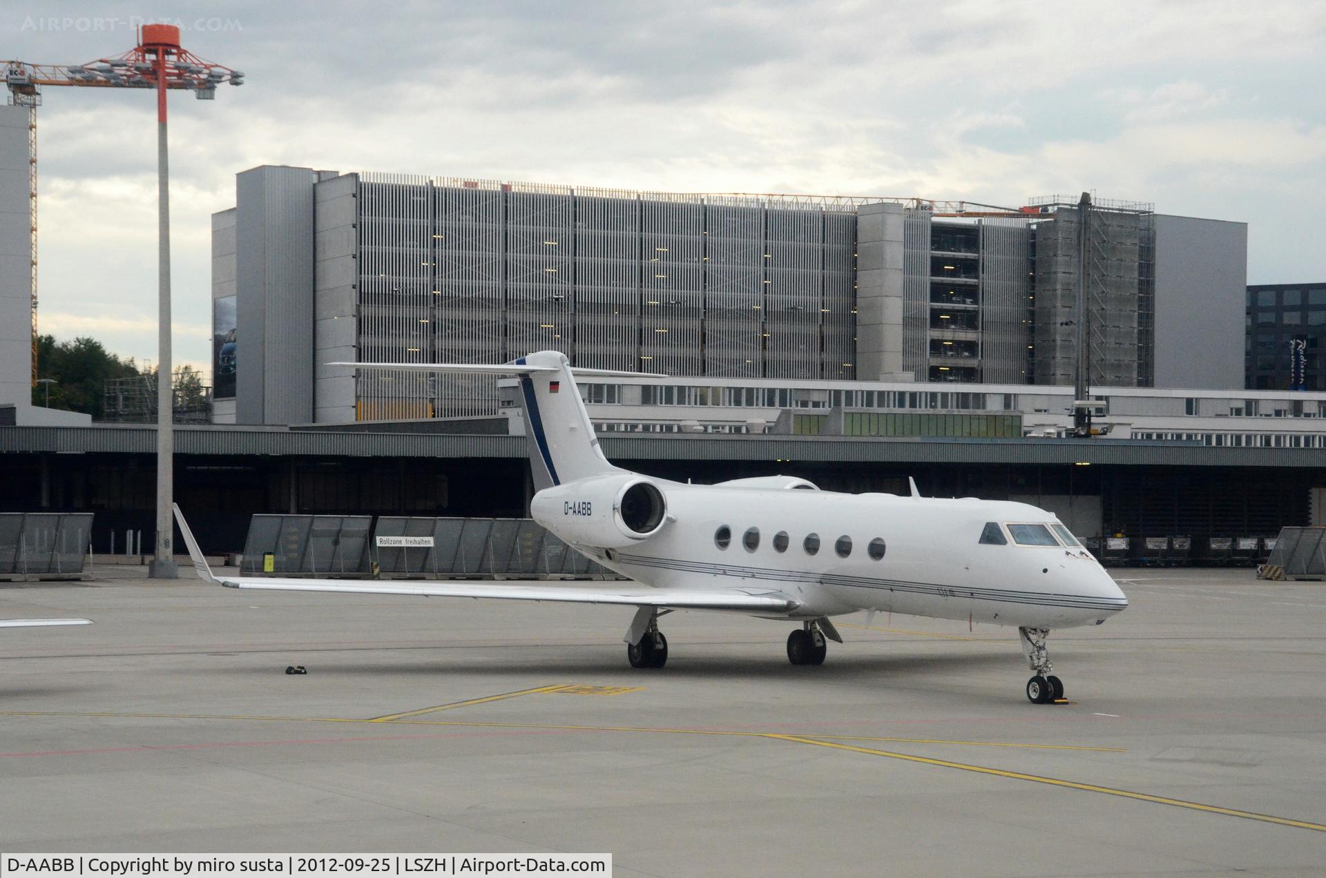 D-AABB, 2007 Gulfstream Aerospace GIV-X (G450) C/N 4091, DC Aviation Gulfstream Aerospace airplane parking at Zurich-Kloten International Airport, photo through airplane window.