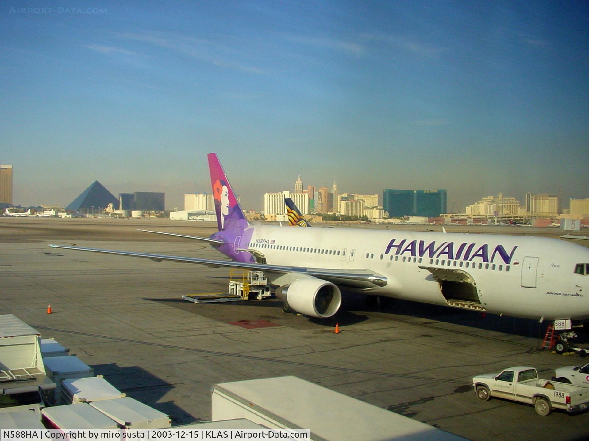 N588HA, 2002 Boeing 767-3CB/ER C/N 33466, Mc Carran International Airport in Las Vegas, view from terminal building.