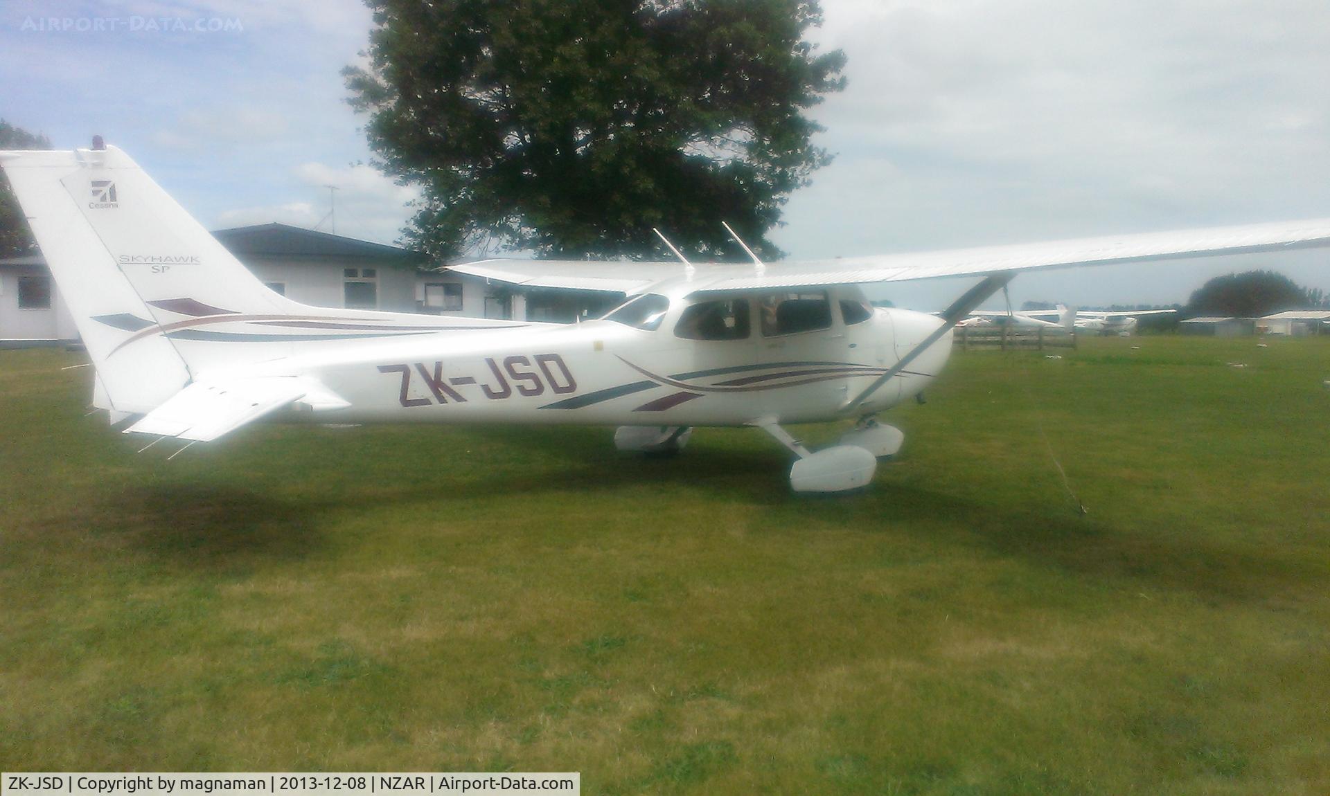 ZK-JSD, 2006 Cessna 172S C/N 172S10260, Bit fuzzy as phone lens was a bit grubby.