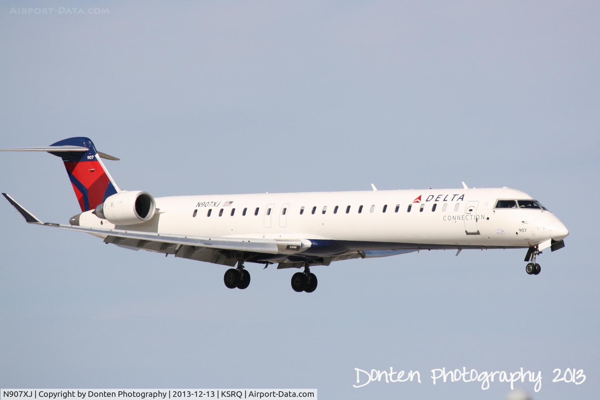 N907XJ, 2007 Bombardier CRJ-900ER (CL-600-2D24) C/N 15139, Delta Flight 3493 operated by Endeavor Air (N907XJ) on approach to Sarasota-Bradenton International Airport following a flight from Laguardia Airport