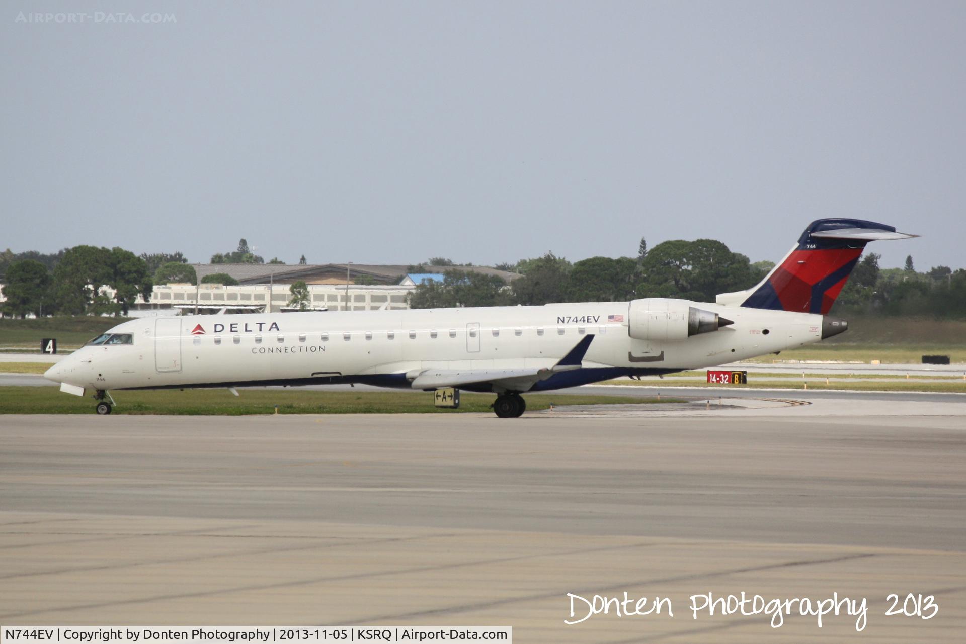 N744EV, 2004 Canadair CRJ-700 (CL-600-2C10) Regional Jet C/N 10157, Delta Flight 4935 operated by ExpressJet (N744EV) arrives at Sarasota-Bradenton International Airport following a flight from LaGuardia Airport