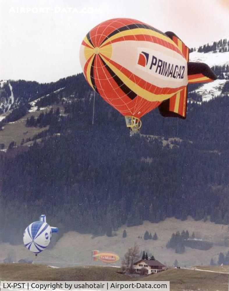 LX-PST, Cameron Balloons DP-80 C/N 2611, LX-PST flying in Chateau D'Oex, Switzerland, circa early 1990's.