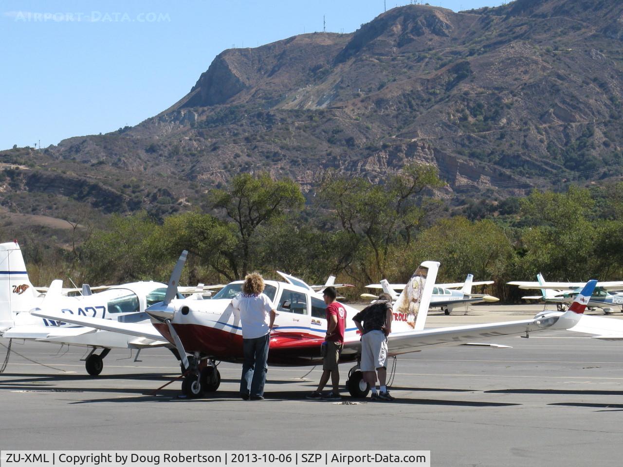ZU-XML, 2009 Ravin 500 C/N 0905021, 2009 SA Ravin Aircraft CC RAVIN 500, Lycoming IO-540 260 Hp, retractable gear, composite construction, similar in concept to PA-24 COMANCHE, on Troll Air Round the World Flight, pilot Calle Hedberg with admirers