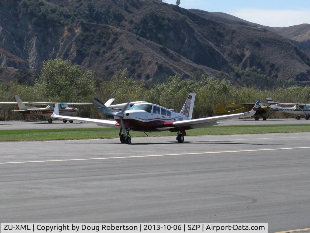 ZU-XML, 2009 Ravin 500 C/N 0905021, 2009 SA Ravin Aircraft CC RAVIN 500, Lycoming IO-540 260 Hp, tri-blade Hartzell Scimitar prop, of Troll Air on Round the World Solo Flight, production aircraft also available kit-built based on concept of PA-24 COMANCHE, landing roll Rwy 04