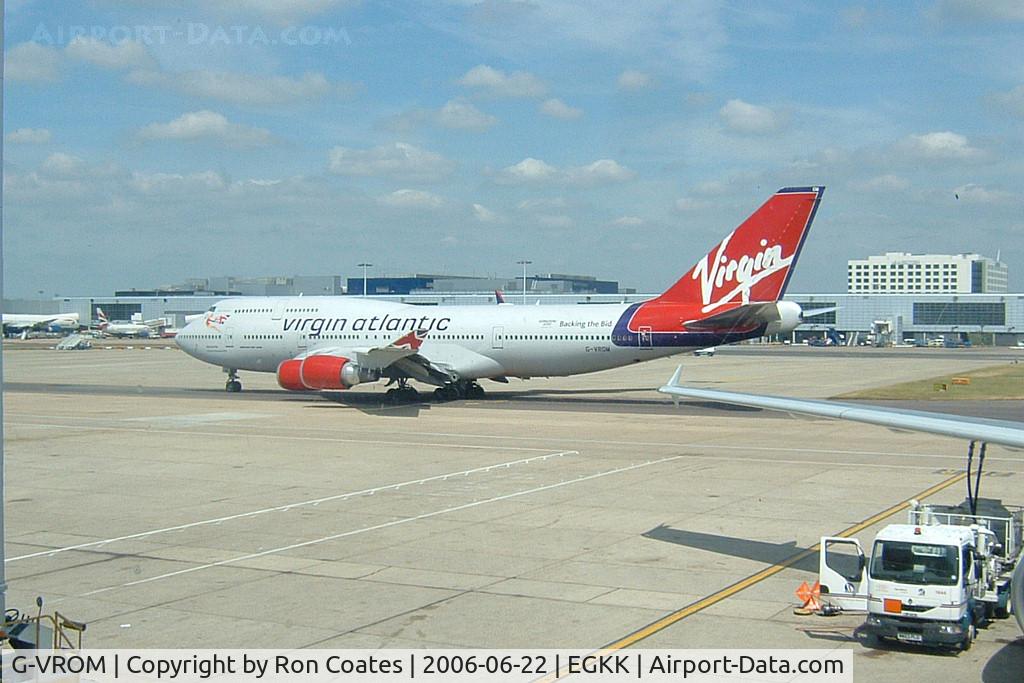 G-VROM, 2001 Boeing 747-443 C/N 32339, A Virgin Atlantic 747 moves out of its gate at London's Gatwick Airport
