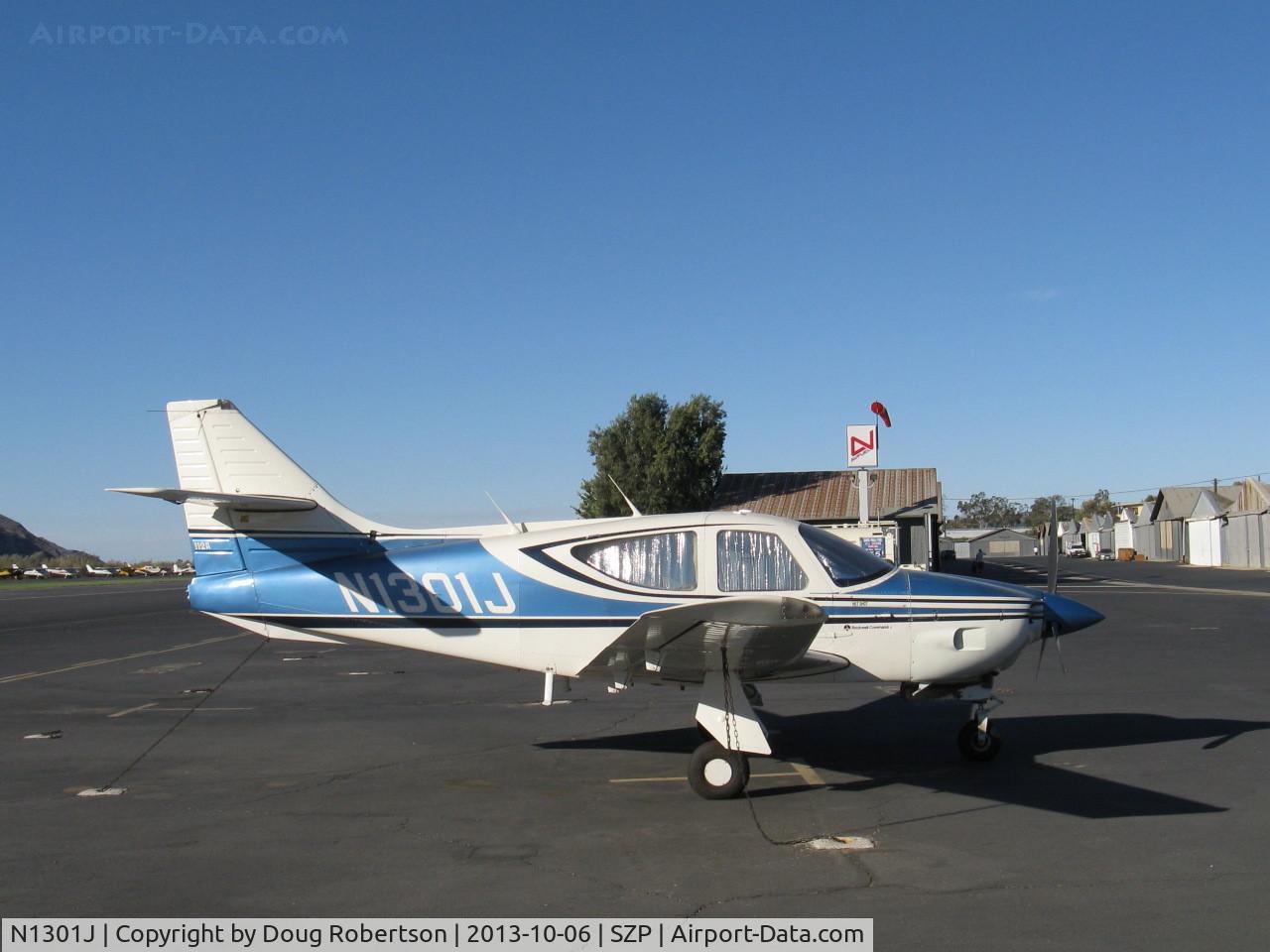 N1301J, 1975 Rockwell International 112A Commander C/N 301, 1975 Rockwell 112A COMMANDER 'HOTSHOT', Lycoming IO-360-C1D6 200 Hp, on transient ramp