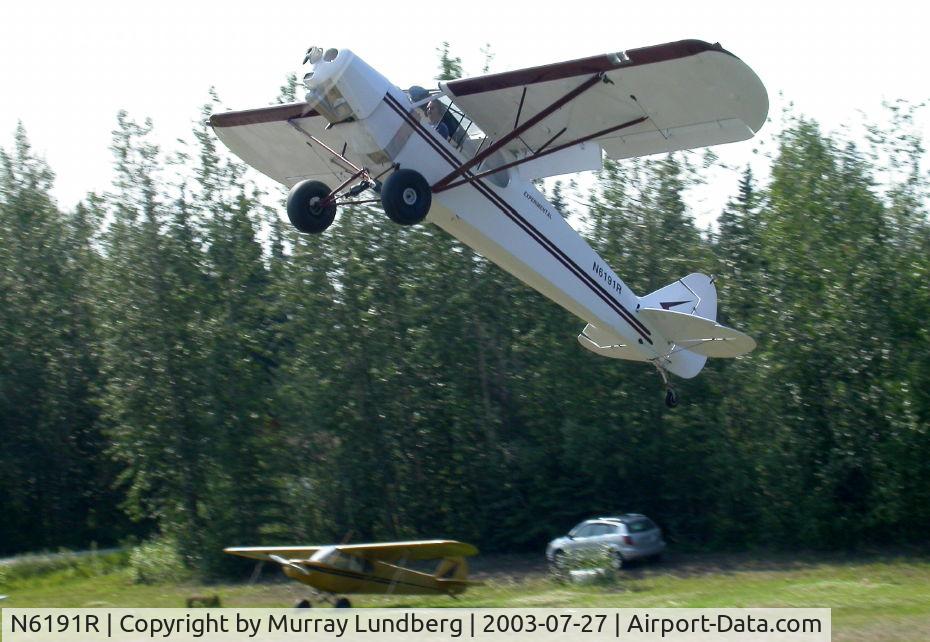 N6191R, Rufli Theodore J RUFLI C/N 001, Taking off from a grass strip along the Chena River at Fairbanks.