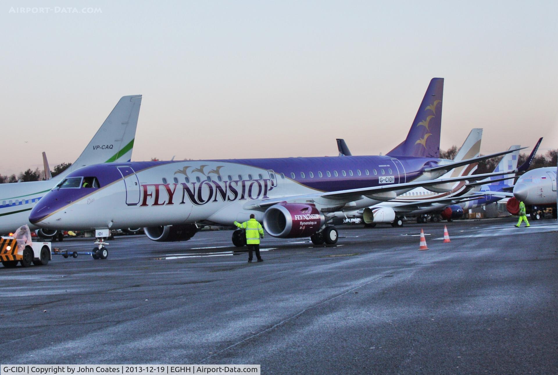 G-CIDI, 2013 Embraer 190LR (ERJ-190-100LR) C/N 19000616, ex PH-FNS being towed towards paintshop